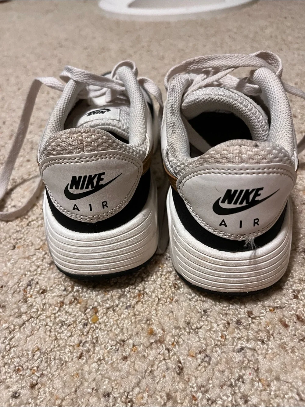 Nike White and Black Mesh Sneakers with Gold Swoosh